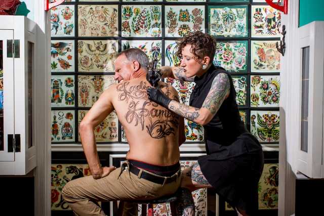 A Sneak Peak At What's In Store for our 2023 Calendar! Dave getting a Ladies of Hampden tattoo.